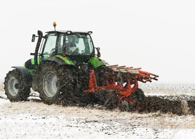 Tractor skating in the snow
